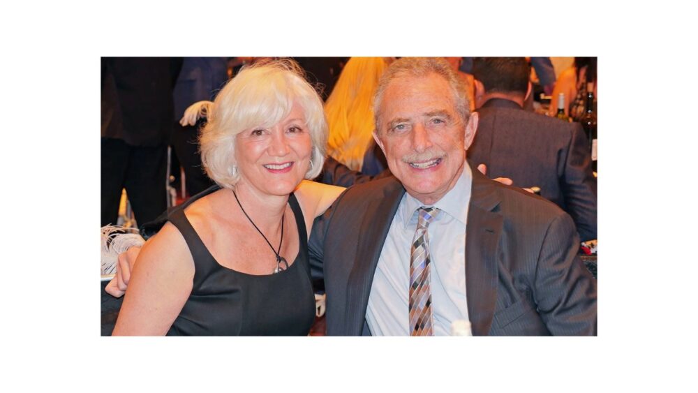 Ron Antinori and a guest attend a Jesuit High School event in Tampa.