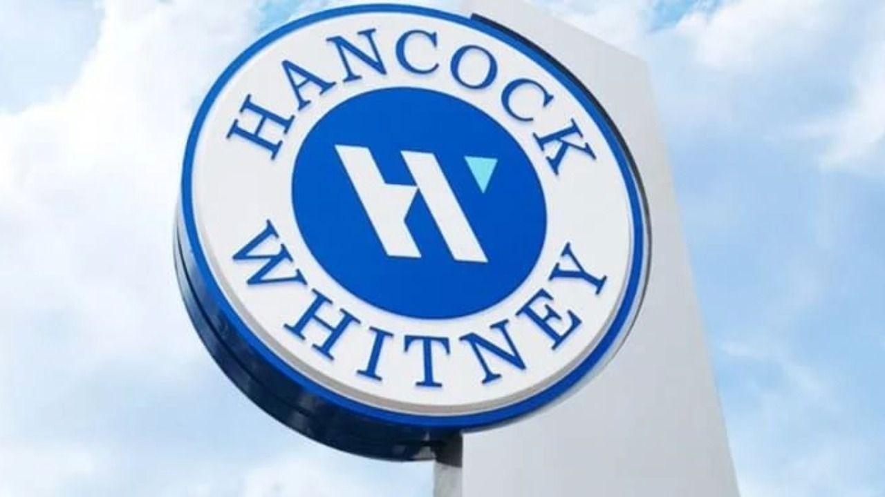 Hancock Whitney bank sign outside branch location