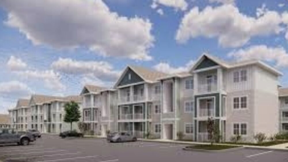 Rendering of a three-story multifamily apartment community planned along the Hillsborough River in Tampa