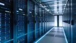 A row of server racks inside a modern data center