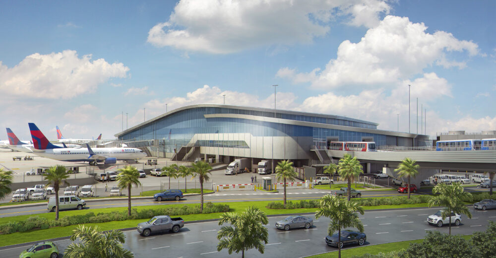 Exterior rendering shows Tampa International Airport’s planned Airside D terminal with aircraft on the apron and the automated people mover nearby.