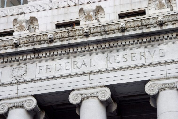 Federal Reserve building facade with carved “Federal Reserve” inscription and classical columns
