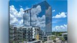 Midtown East office tower rising above the Midtown Tampa mixed-use district