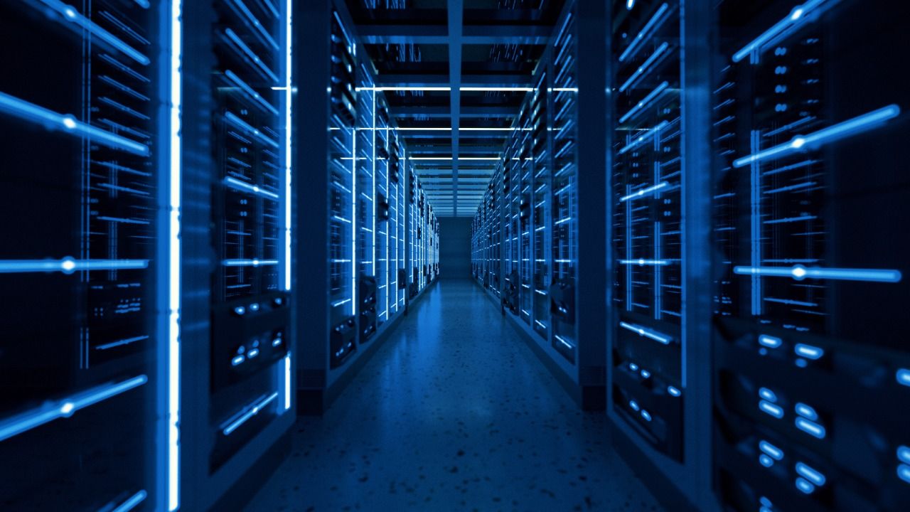 Rows of servers inside a modern data center facility