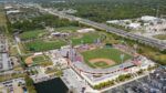 Aerial view of BayCare Ballpark in Clearwater, showing the stadium, outfield berm seating area and surrounding fields.