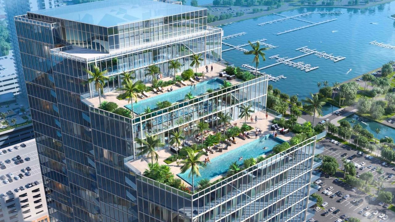 Rendering of Waldorf Astoria Residences St. Petersburg showing tiered pool decks and waterfront views