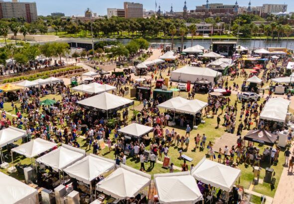 Aerial view of the Tampa Bay Wine & Food Festival Grand Tasting at Curtis Hixon Waterfront Park in downtown Tampa.