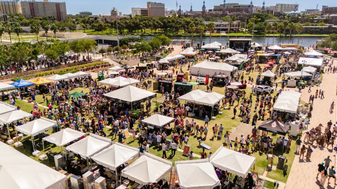 Aerial view of the Tampa Bay Wine & Food Festival Grand Tasting at Curtis Hixon Waterfront Park in downtown Tampa.