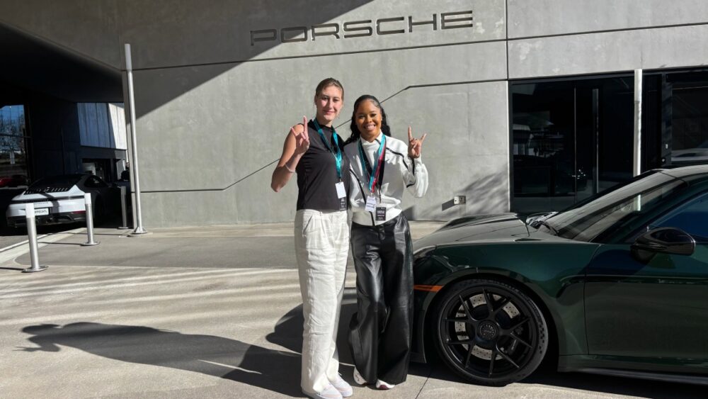 USF student interns Faith Quails and Marcella Copeland at the Porsche Experience Center in Atlanta during Burmester luxury audio training.