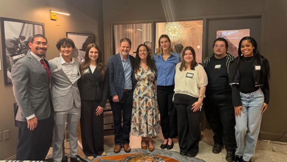 Charles and Lauren Weiner with student interns at The Sound Attic listening gallery in Tampa.