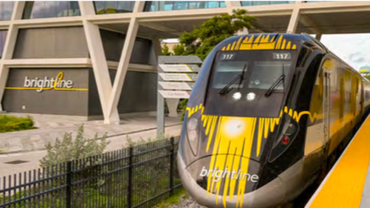 Brightline train at station platform representing passenger rail service in Florida