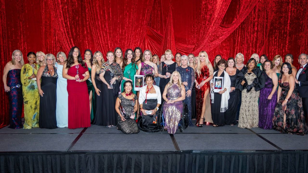 Group of 2026 Women Who Win honorees on stage at The Vinoy Resort & Golf Club