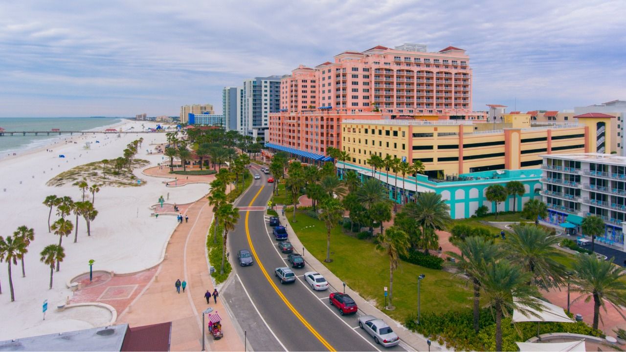 Clearwater Beach coastline with hotels, roadway and pedestrian walkway