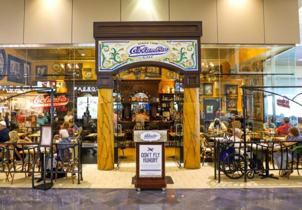 Columbia Restaurant café location inside Tampa International Airport with travelers dining