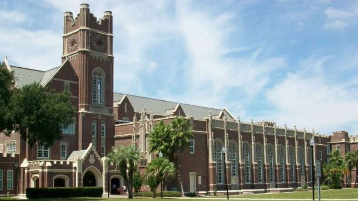 Historic Hillsborough County school building with clock tower and brick façade, representing district facilities funded by the half-penny sales tax.