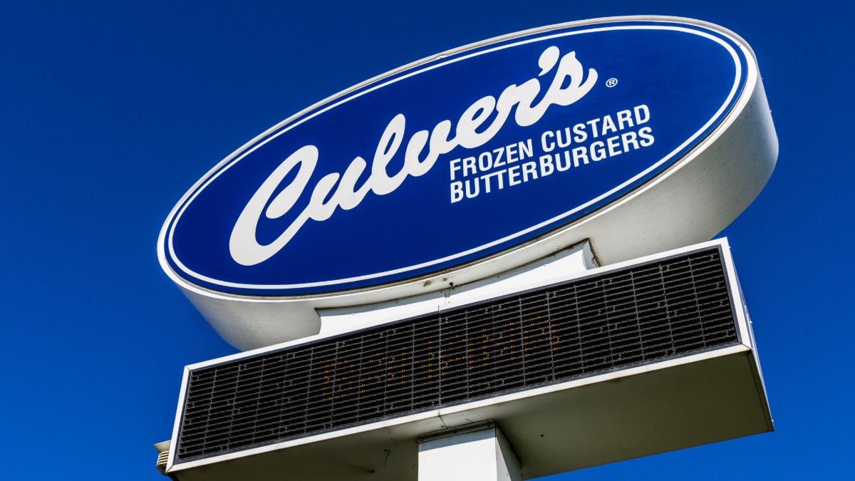 Culver’s restaurant sign with logo against blue sky