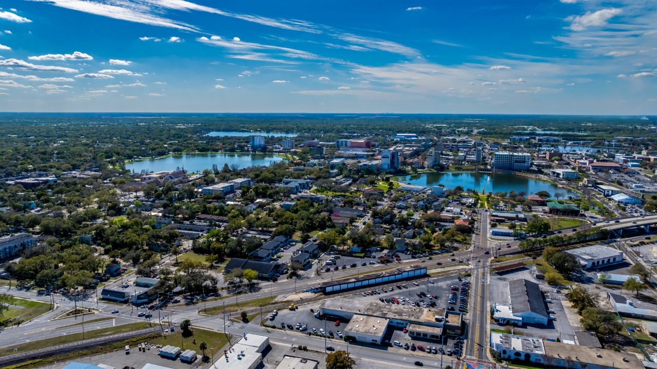 Aerial view of Polk County with lakes, roads and surrounding residential and commercial development