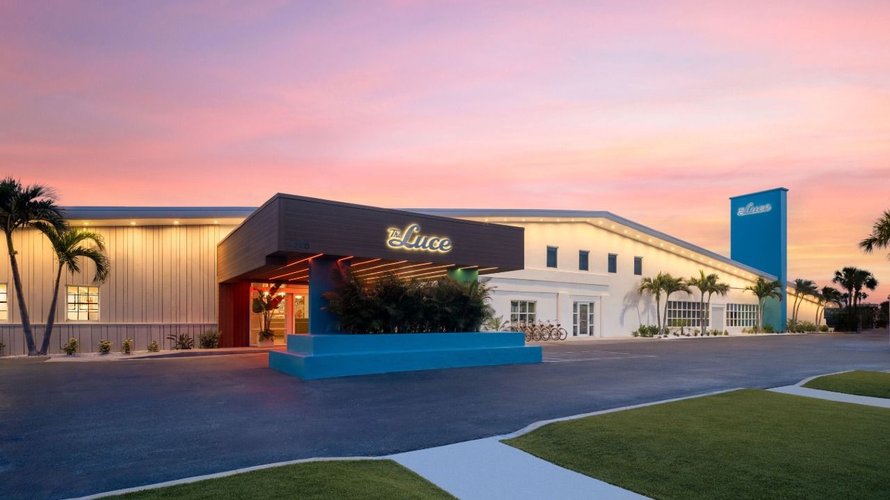 Exterior of The Luce Marriott Tribute Portfolio hotel on St. Pete Beach at sunset