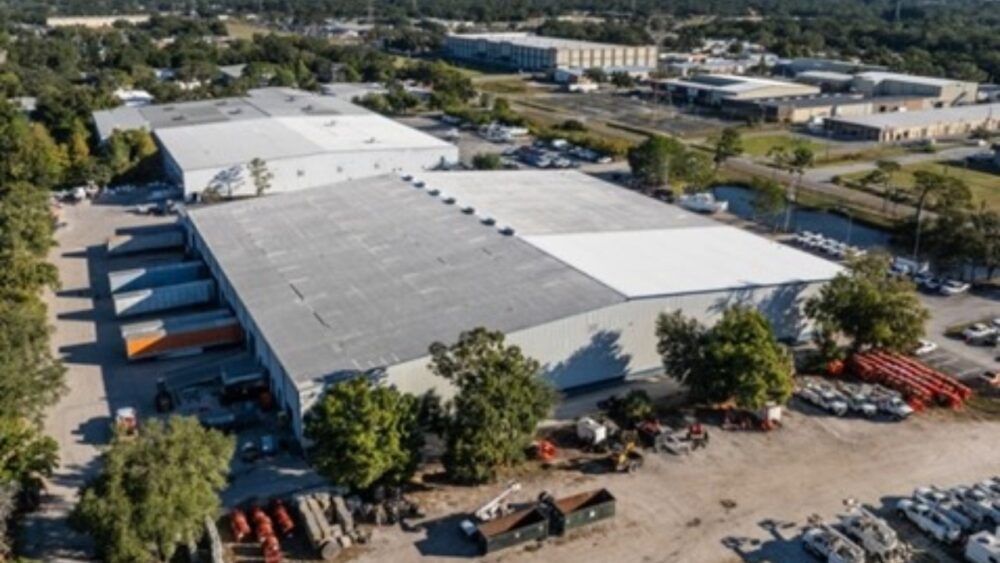 Aerial view of two industrial warehouse buildings in Clearwater acquired by Bromley Companies.
