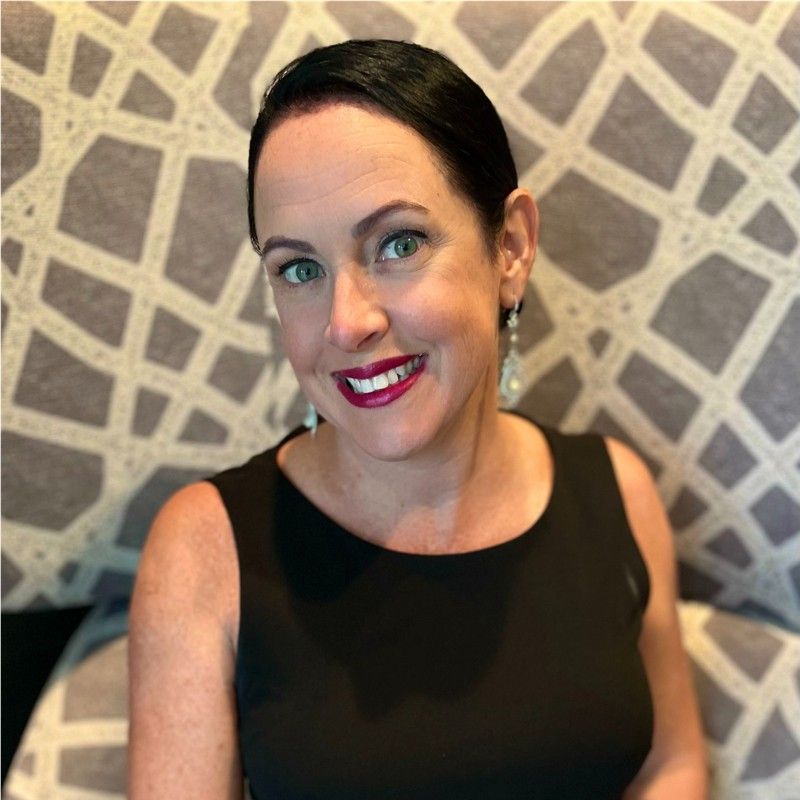 Headshot of Ashley Wait-Woodcock, chief marketing officer of AWS Title Services