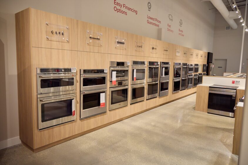 Interior and exterior views of the CITY HOME showroom in Plant City, Florida.