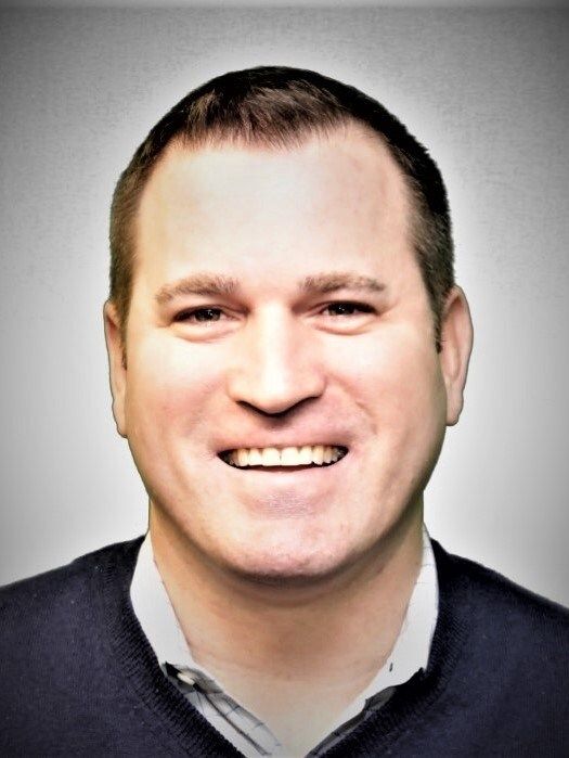Headshot of Christopher J. Tebben, chief executive officer of Checkers Drive-In Restaurants