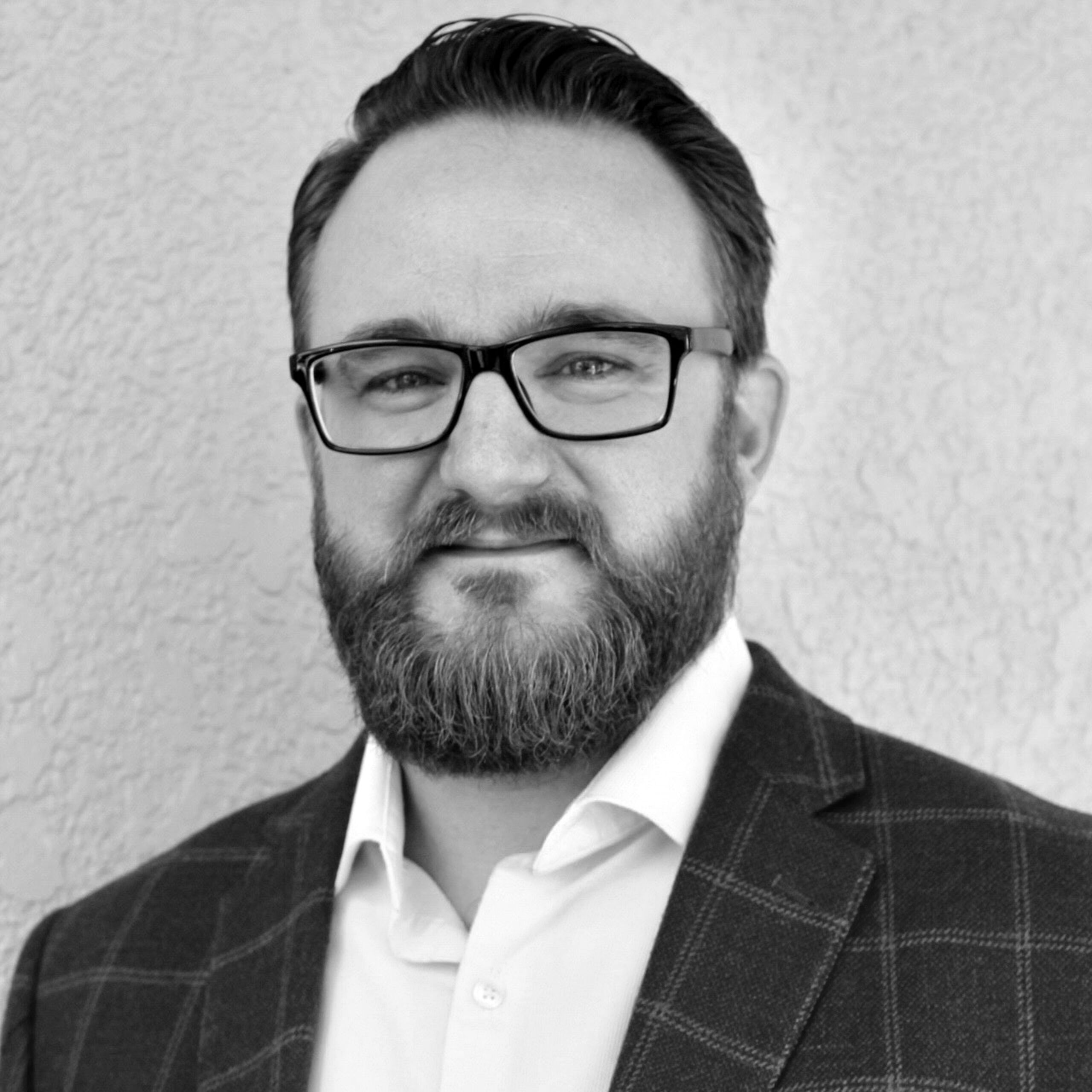 Headshot of Justin Kimmich, co-founder and principal architect of Kimmich | Smith Architecture