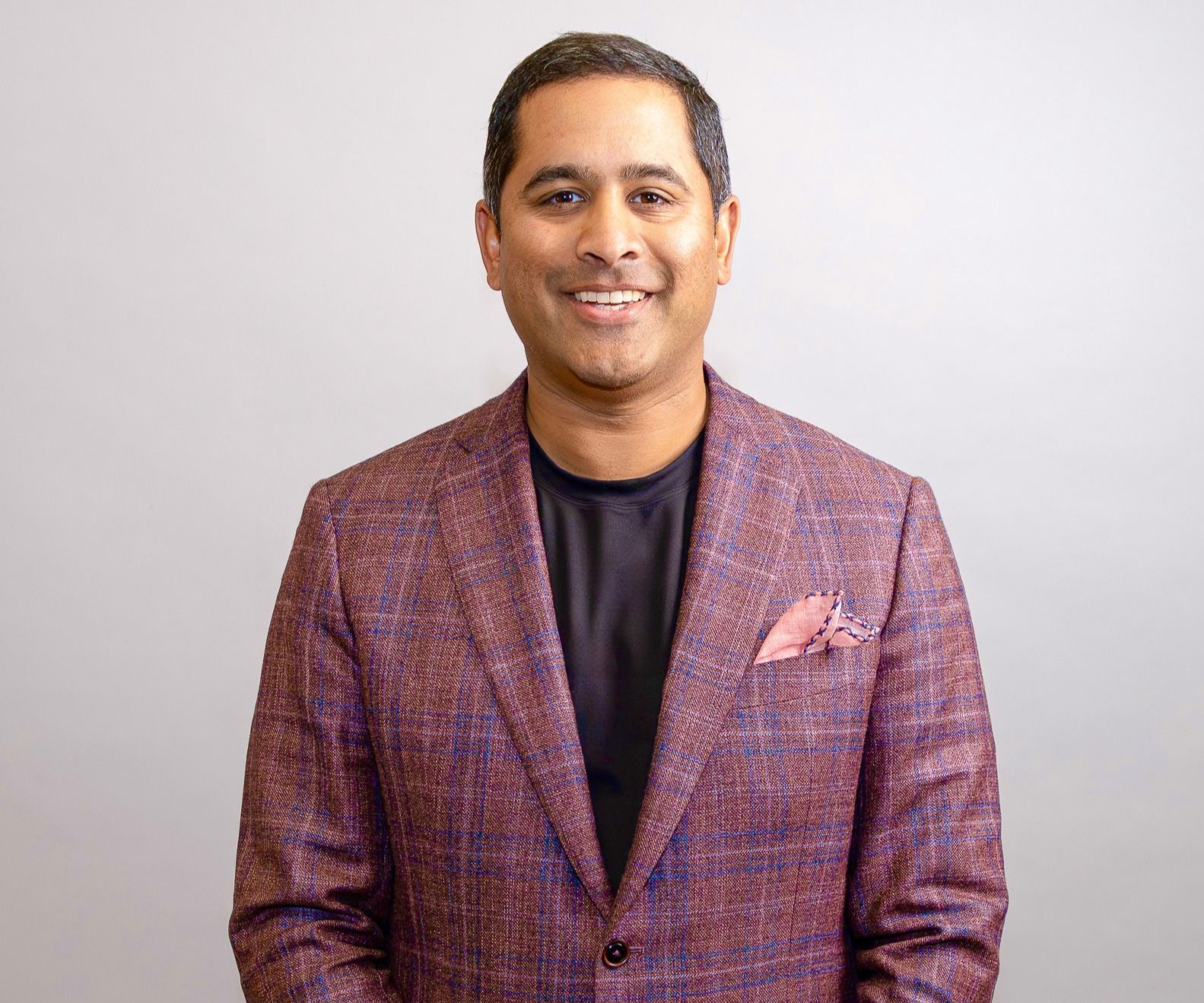 Headshot of Kal Gullapalli, founder and chief executive officer of Built Different Brands
