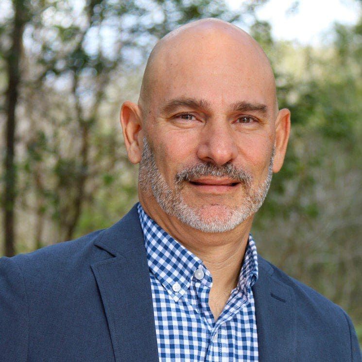 Headshot of Mike Trepper, president and CEO of Pasco Kids First