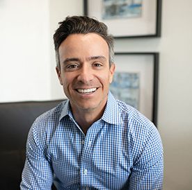 Headshot of Paul DeGance, co-founder and chief executive officer of 1Source Partners