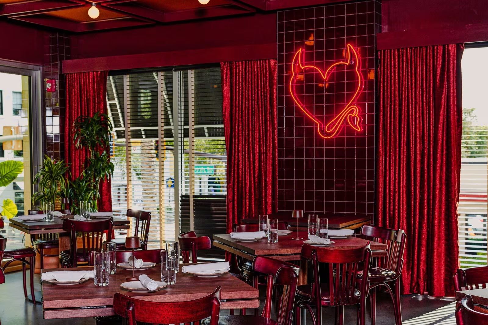 Neon Forbici logo inside the Sundial restaurant