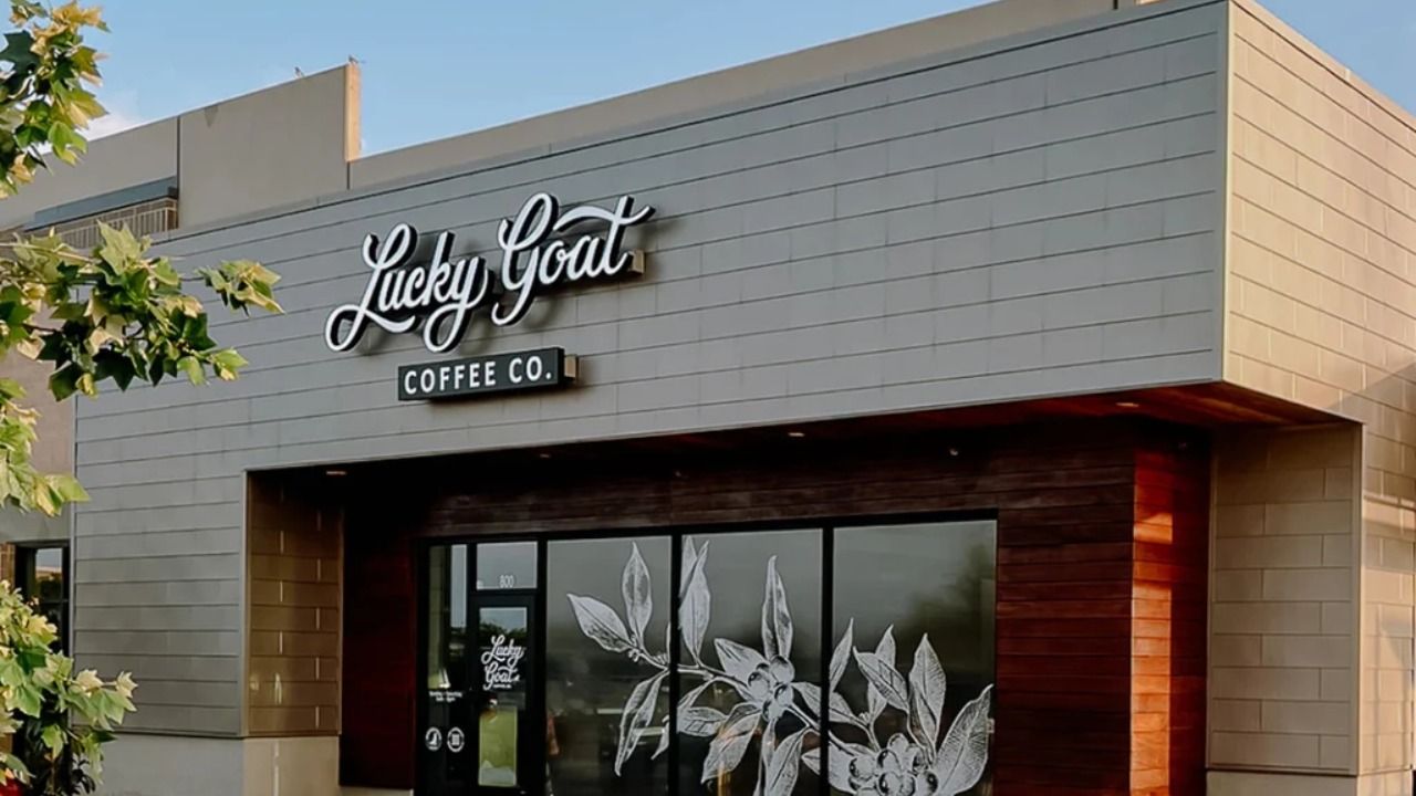 Exterior of a Lucky Goat Coffee café with the company's signage above the entrance.