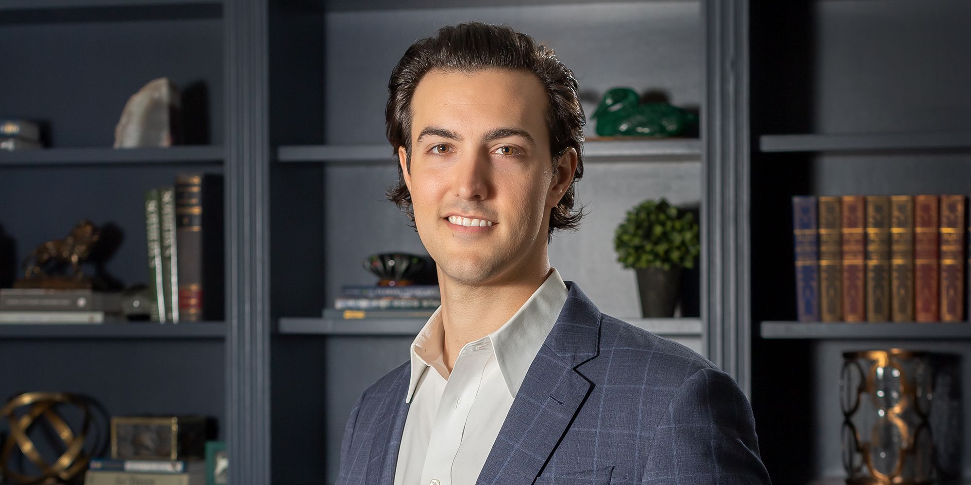Garrett Greco, a Tampa real estate broker and host of the Tampa Bay Developer podcast, poses for a portrait.