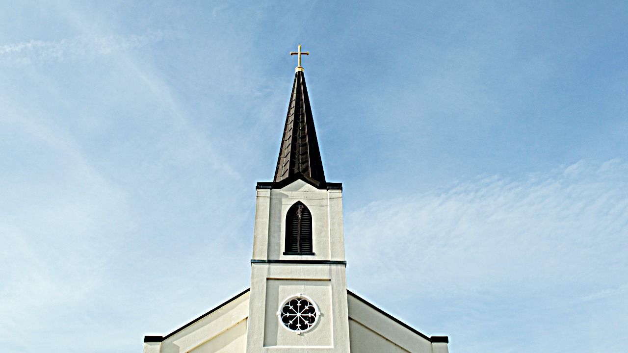 Church steeple rises above a house of worship in St. Petersburg, where the city launched a program to help churches develop affordable housing.