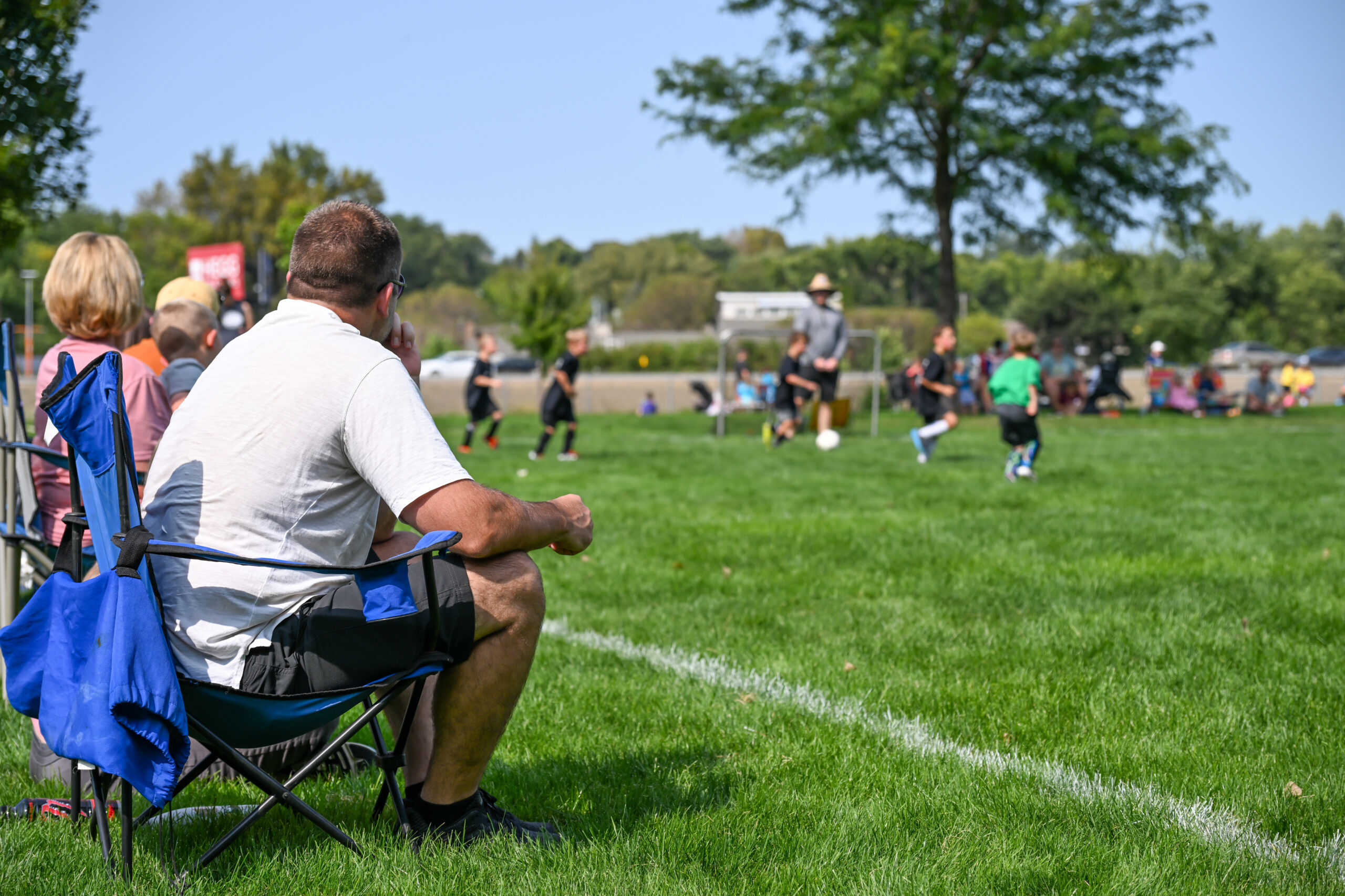 Youth soccer players competing in a match