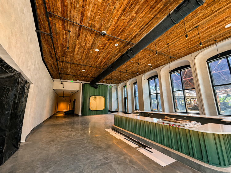 Interior of the Gasworx office building in Ybor City, showing the lobby and café and bar area under construction.