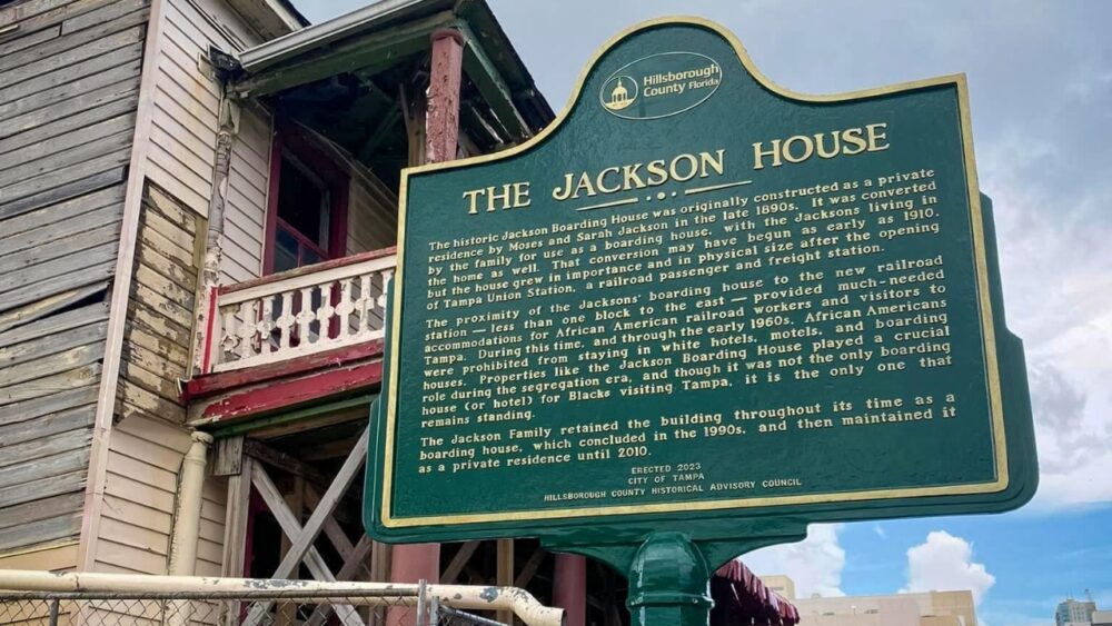 Historic Jackson House marker outside the deteriorating boarding house in downtown Tampa