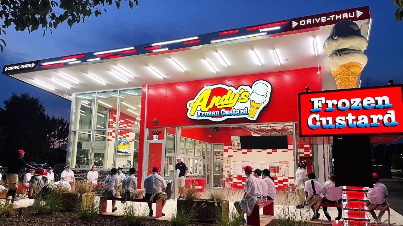 Andy’s Frozen Custard restaurant with a drive-thru, walk-up service windows and outdoor seating.