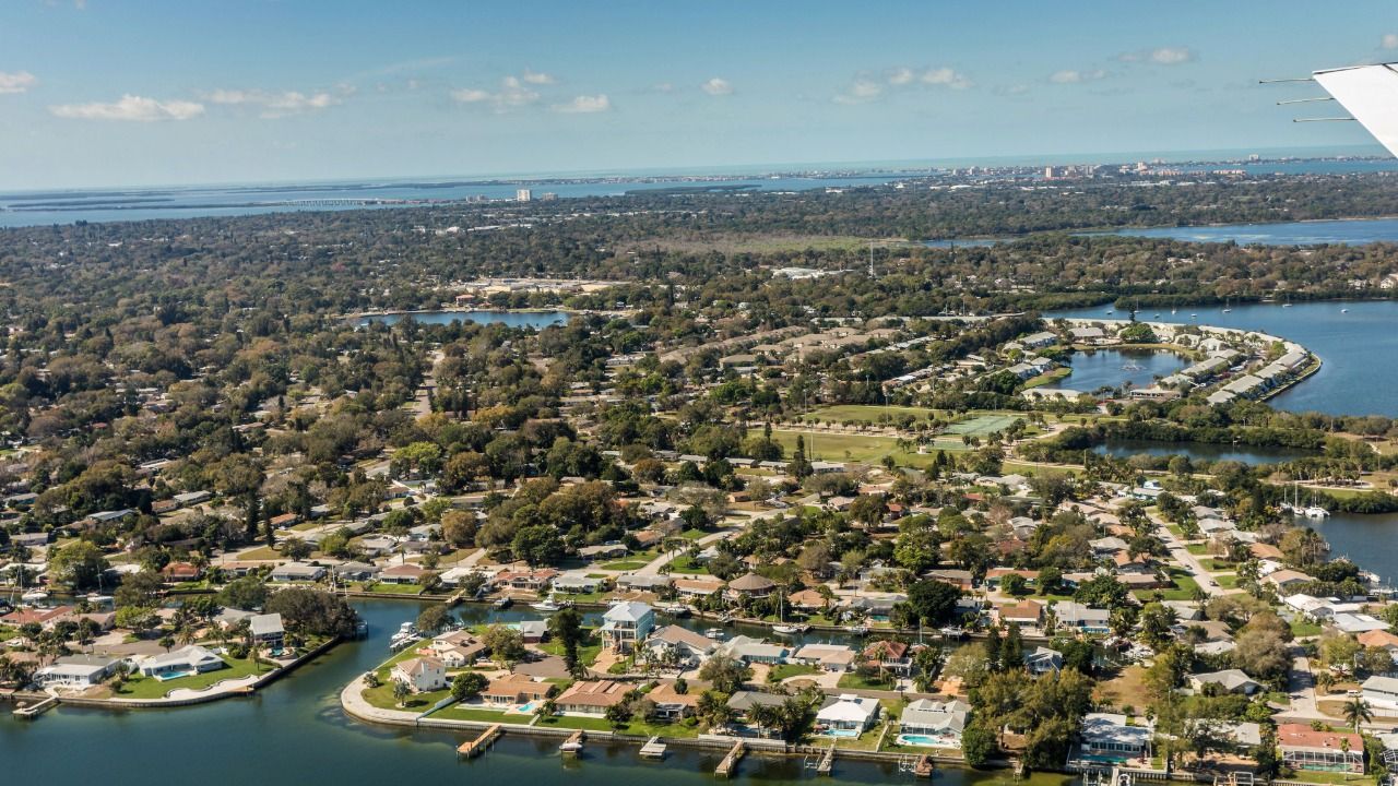Aerial view of waterfront homes, waterways and neighborhoods across Pinellas County, Florida.