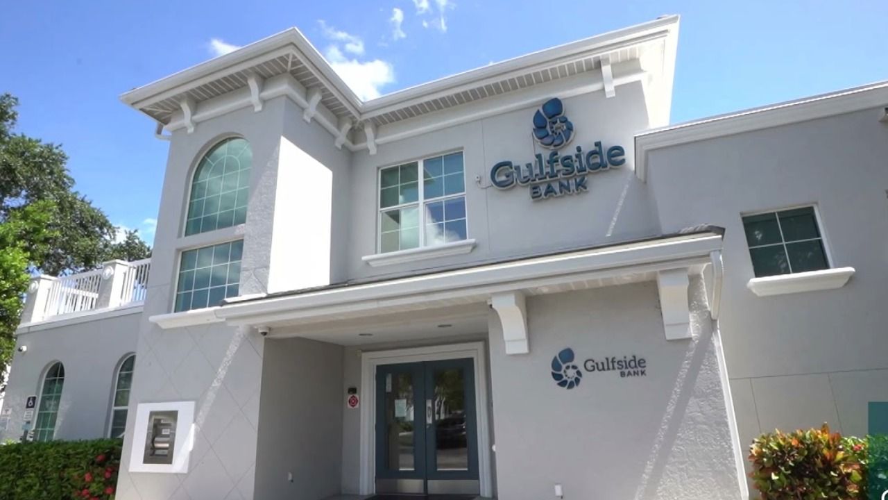 Exterior of Gulfside Bank in Sarasota, Florida, showing the bank's signage and main entrance.